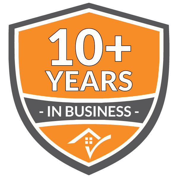 Michigan Roofing Company: 10+ Years in Business Badge. Symbolizes experience and reliability in roofing services. Orange shield design.