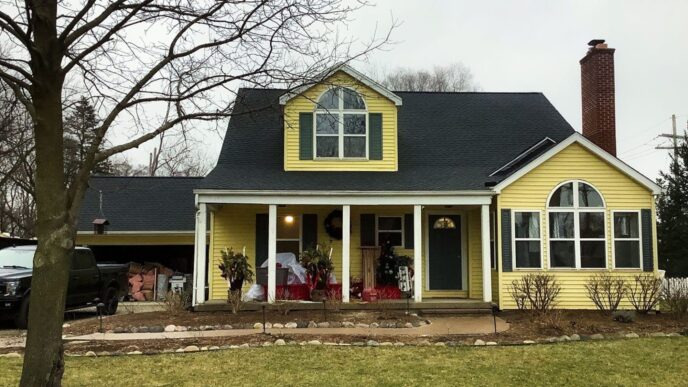 Photo of a residential roof replacement and siding after installation with high quality materials
