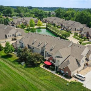 New roofing systems in Plymouth MI, wriel view of community with new roofs on their buildings.