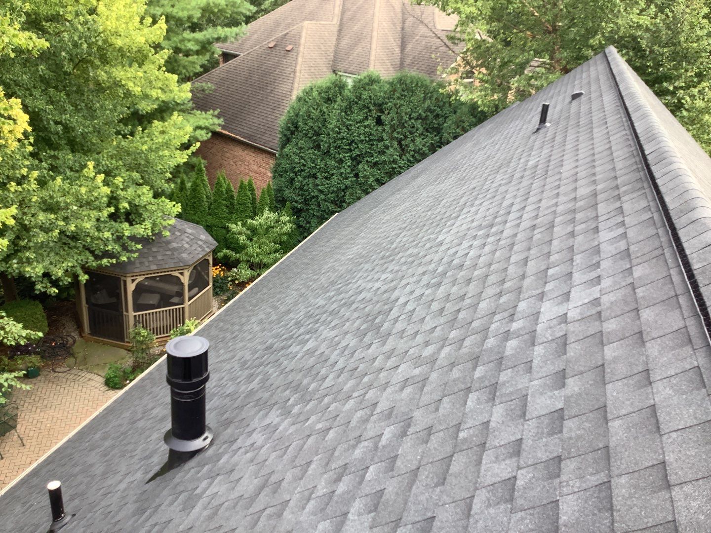 Completed roof installation after photo for a home in Ann Arbor, showing finished roofing work