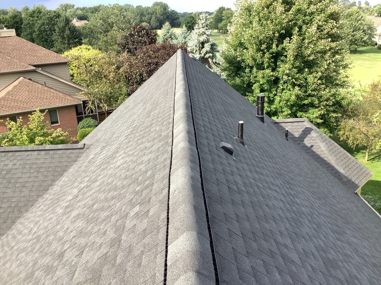 Newly installed roof on a residential home in Ann Arbor, Michigan, following completed roofing project