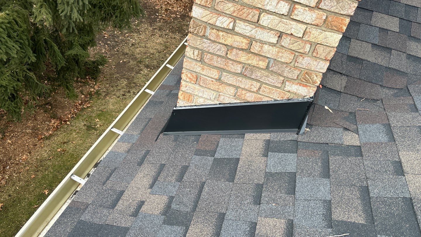 Completed roof replacement on a residential home in Brighton, MI, after project for Mike Fierk.