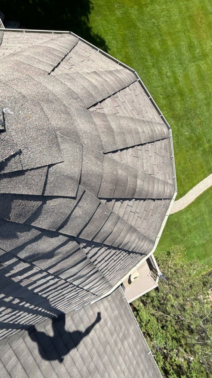 Home exterior in Commerce Township, MI shown before roofing work, documenting pre-project condition