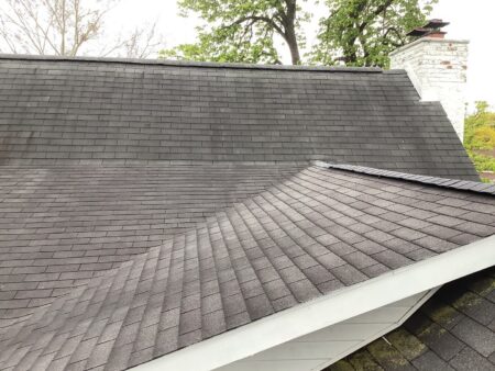 The roof and chimney on Tess's Plymouth home before roof replacement.