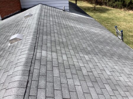 Before Ann Arbor roof replacement: shows the original gray shingle roof with vents. See Bills's Ann Arbor roof before replacement process.