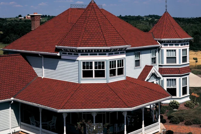 Carriage House by CertainTeed featuring Georgian Brick roofing on a home. The roof is a prominent feature, showcasing the aesthetic appeal and design.