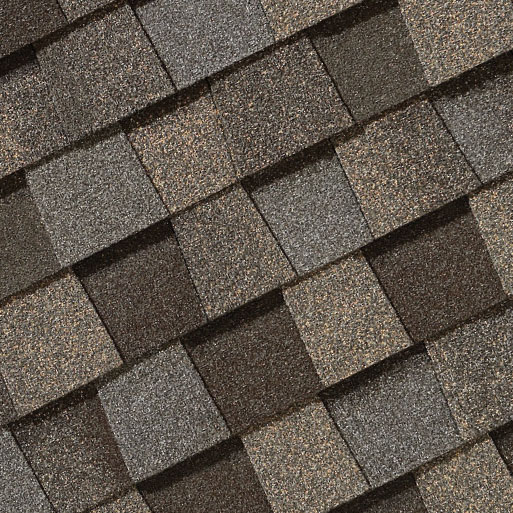 Close-up of CertainTeed NorthGate Shingles. Asphalt roofing material featuring a mix of brown and gray tones, providing a textured, dimensional look.