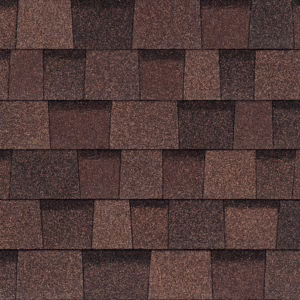Close-up of Owens Corning Duration Flex Shingles in Brownwood. Durable roofing material showcasing a rich, textured brown for enhanced roof aesthetics.