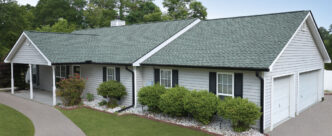 GAF Timberline UHDZ shingles in slate on a home. The roofing provides a durable, protective layer, enhancing the house's curb appeal and value.