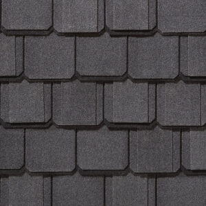 Close-up of Grand Manor Black Pearl shingles by CertainTeed, showcasing the luxury asphalt roofing's texture and design. Perfect for high-end homes.