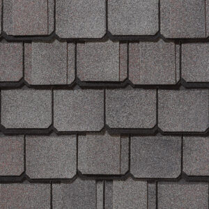 Grand Manor Colonial Slate shingles by CertainTeed. Close-up of roofing material showing color and texture of the designer asphalt roofing shingles.