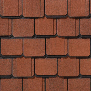 Grand Manor Georgian Brick roofing by CertainTeed. A close-up showcases the rich texture and color variation of the luxury asphalt shingles, Georgian Brick.