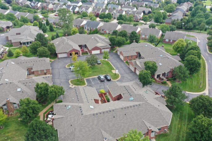 Multi-family roofing company in Shelby Township MI. Ariel drone shot of community.