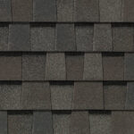 Close-up of CertainTeed Landmark Pro Max Def Driftwood roofing shingles showcasing their color and texture. Ideal for roof replacement and new construction.