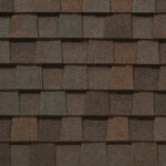 CertainTeed Landmark Pro Max Def Heather Blend shingles. Roofing material texture with brown and gray tones. Durable and aesthetically pleasing roof.
