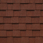 Close-up of CertainTeed Landmark Pro Max Def Red Oak shingles. High-definition roofing with rich, deep red-brown color and texture for enhanced curb appeal.
