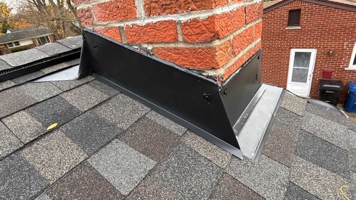 5-Star Roofing: Leila A's Redford home with newly installed chimney flashing. Professional roofing services for a secure, long-lasting roof. After roofing.