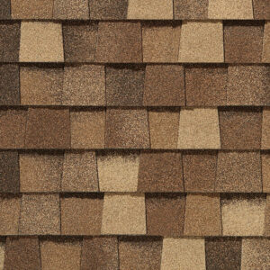 NorthGate by CertainTeed MaxDef Resawn Shake shingles. A close-up showcases rich, blended brown tones and a textured surface, highlighting their durability.