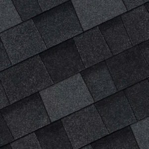Close-up of Owens Corning Duration Flex Shingles in a dark color. Durable roofing material providing long-lasting protection and enhanced flexibility.