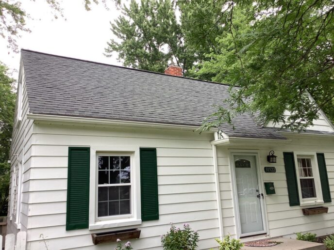 The front of Robert's Garden City home before roof replacement.