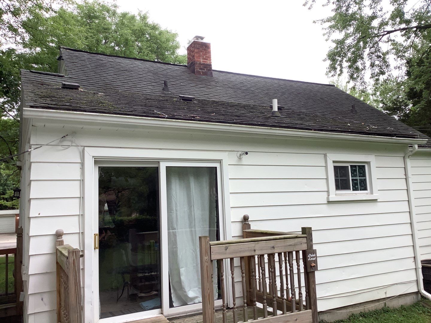 The back of Robert's Garden City home before roof replacement.