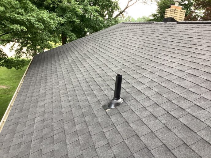 Westland Roof Replacement: Close-up of a newly installed gray shingle roof with a black vent pipe. Quality roofing after replacement roof-after-1.jpg