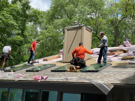 Roof replacement process testimonial: Goto roofing crew with project manager handling skylight window replacement and new shingles. Roofers ensure quality roof replacement. Top notch teamwork exemplified from initial contact with no hidden fees.