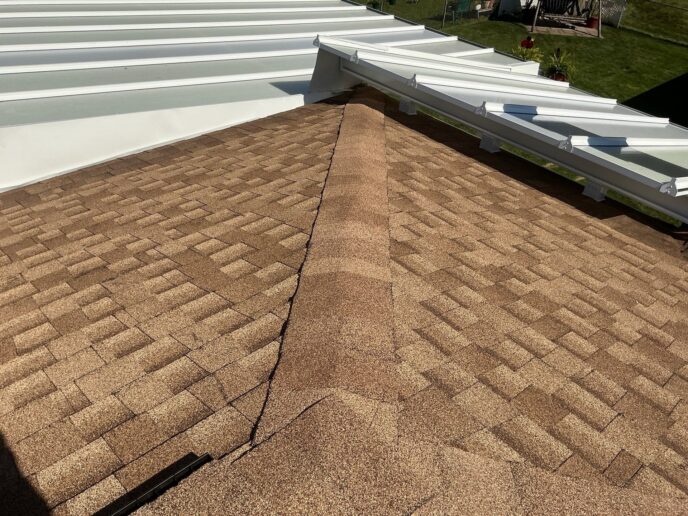 Newly installed roof with awning in Canton