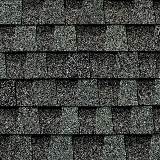 Close-up of Timberline HDZ roofing shingles in Cliffside Gray. Durable and stylish asphalt shingles for residential roofing, enhancing curb appeal.