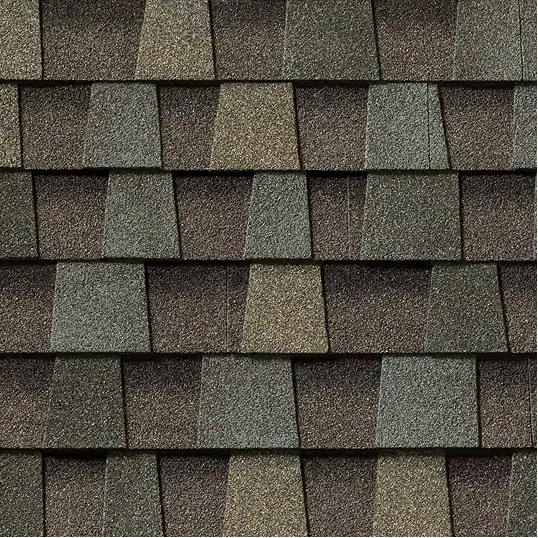 Close-up of Timberline HDZ Sierra Sand shingles. The roofing material features a unique color blend for a textured, dimensional look on a roof.